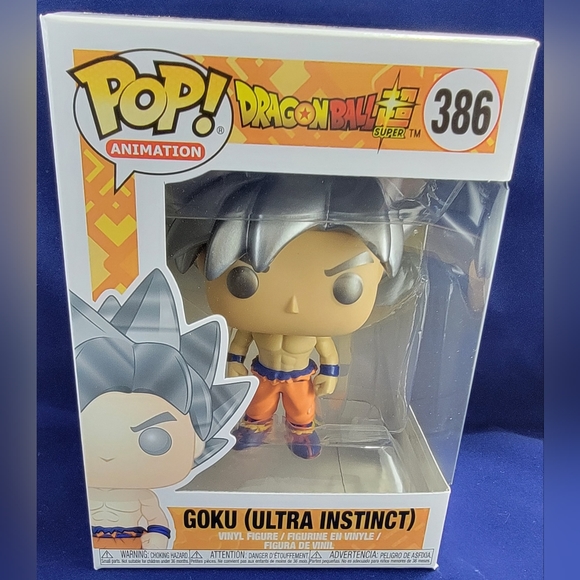 Goku (ultra instinct) funko # 386 (nib) with pop protector - Picture 2 of 7